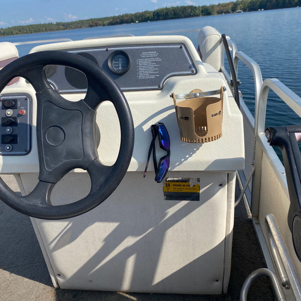 glasses keep on a pontoon holding sunglasses