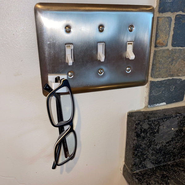 glasses keep on light switch plate