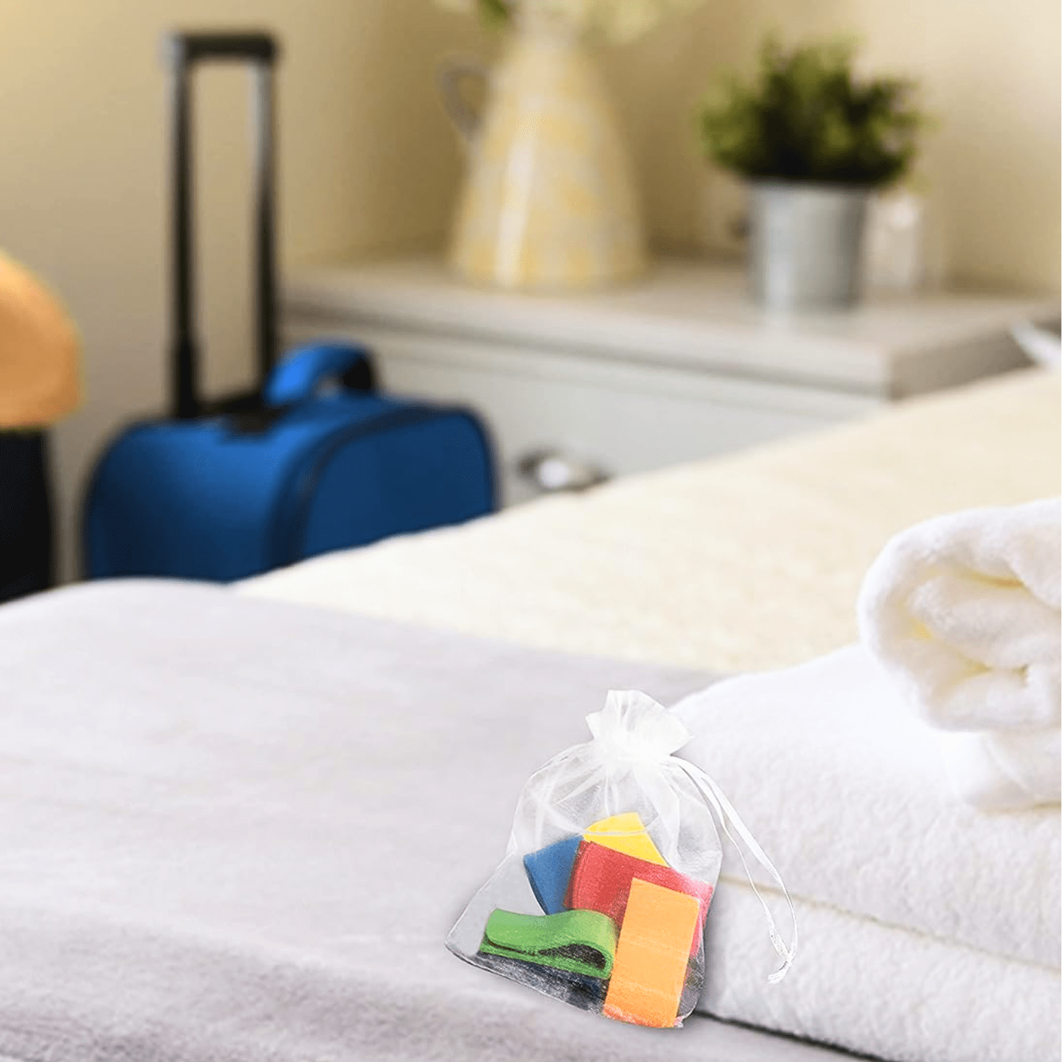 towel keep in mesh bag on hotel bed