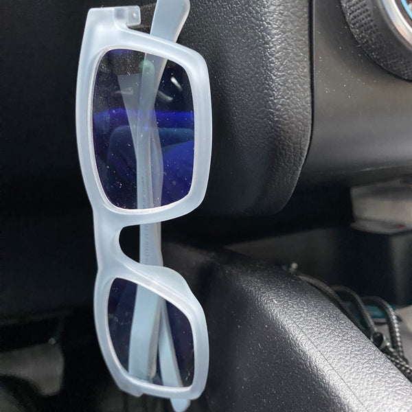 white glasses in car